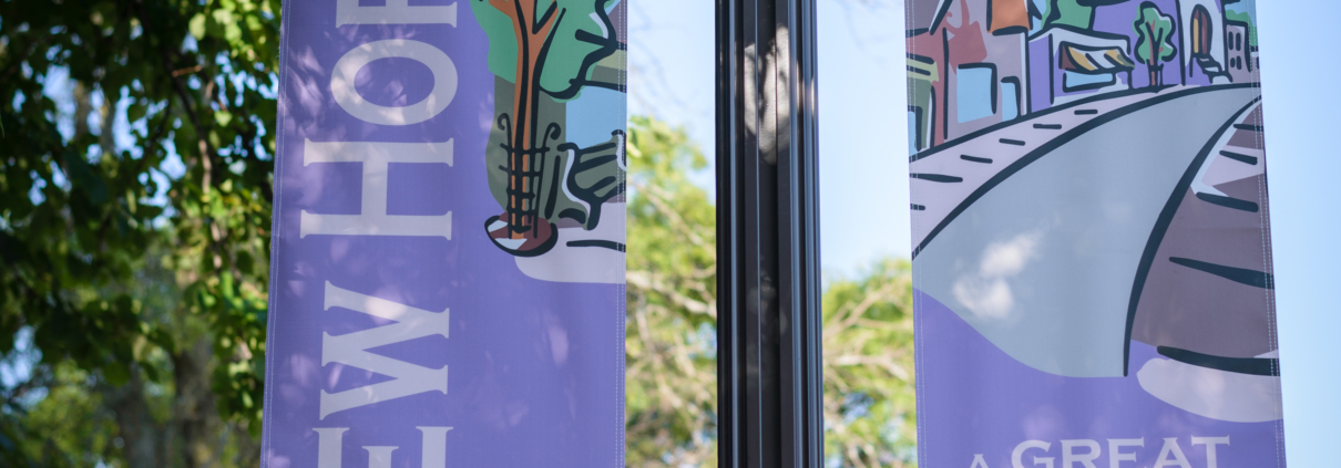 Banner Products: Purple background on New Hope Pole double Banner