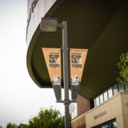 Anoka Technical College pole banner Streetscape Banners - Mainstreet Designs Anoka Technical College pole banner - Anniversary Year