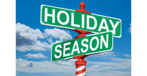 City and businesses holiday decorations red and white striped "Holiday Season" Street pole