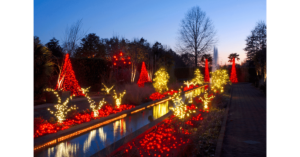 Holiday Lighting- Red and gold holiday lighting along a waterway and park