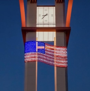 Light American Flag on towering Outdoor clock- Burr Industries